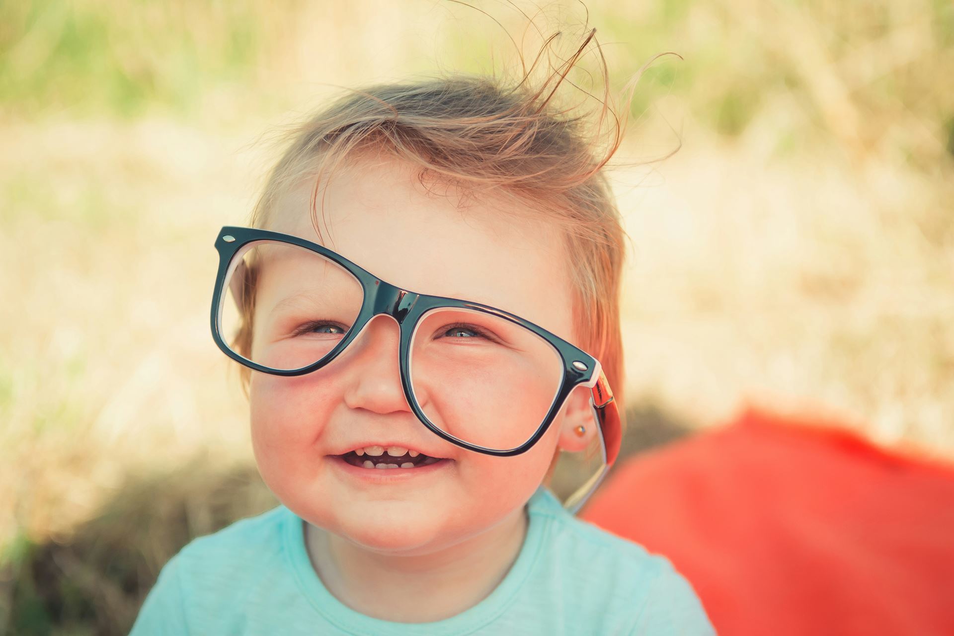 child with glasses